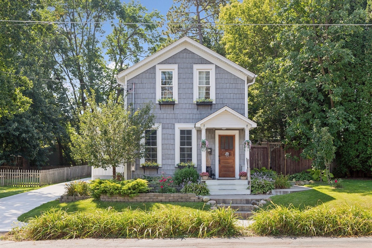 Enchanted Escape's gray exterior and front garden